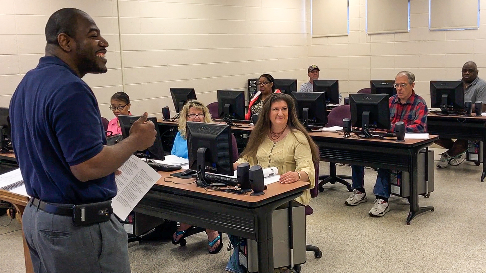 Adult students learning in a classroom