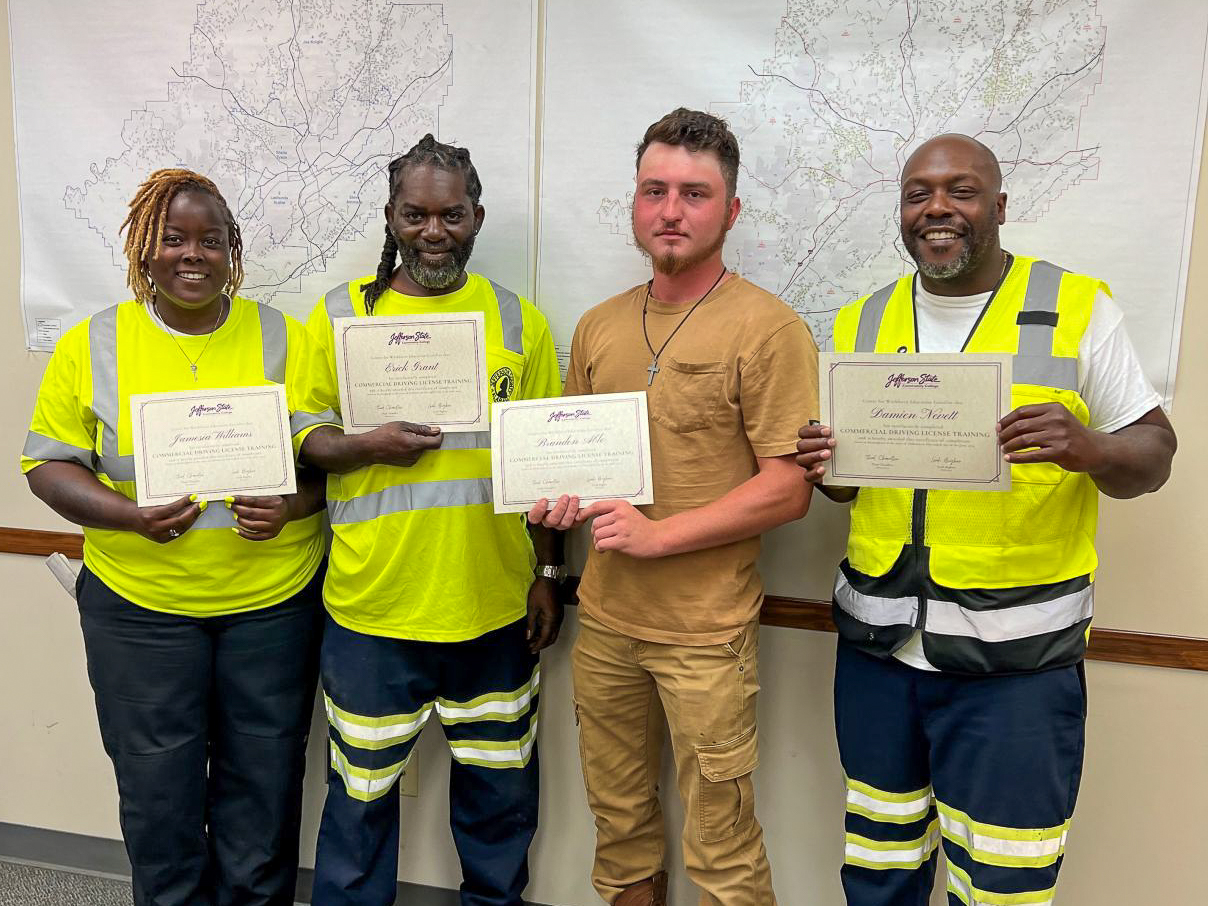 Jefferson County Roads and Transportation employees with CDL training certificates.