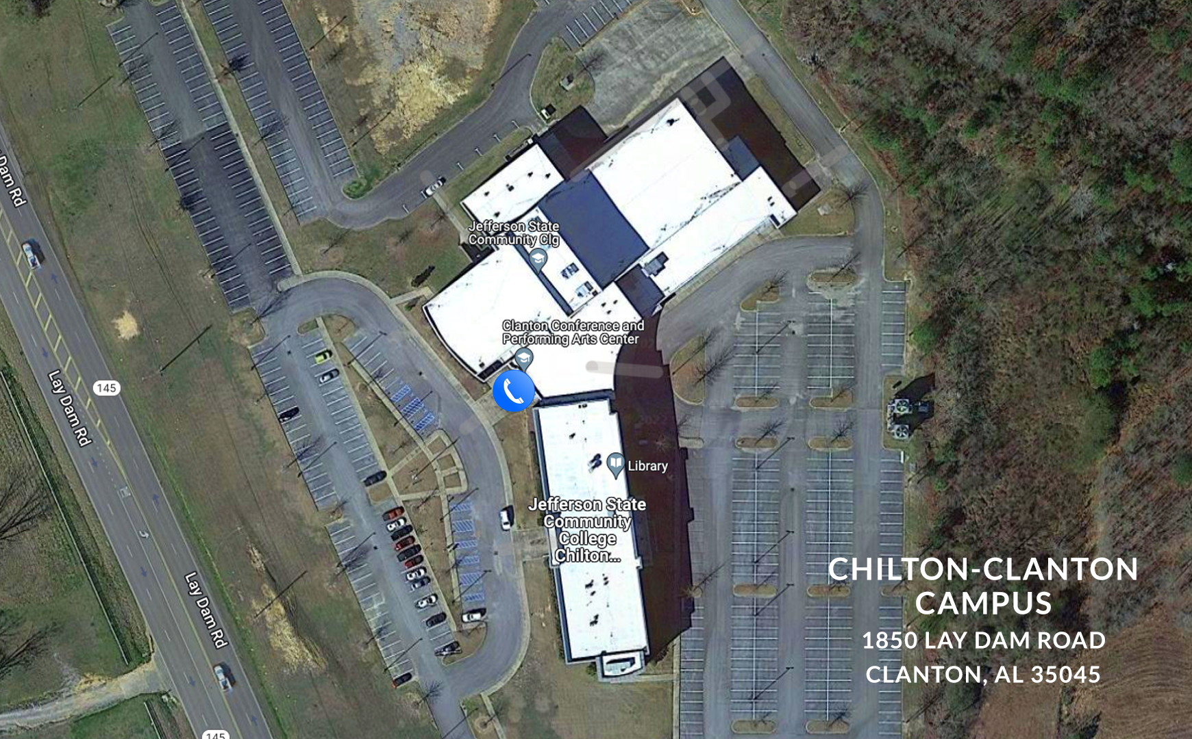 Aerial view of Jefferson State Community College’s Chilton-Clanton campus, showing several connected buildings, surrounding parking lots, trees, and campus address: 1850 Lay Dam Road, Clanton, AL 35045.