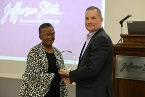 Audrey Normal receives 2025 Distinguished Retiree Award from President Keith Brown