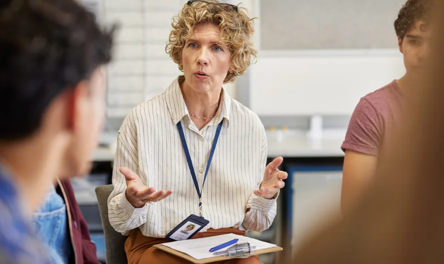 Woman leading an information session.