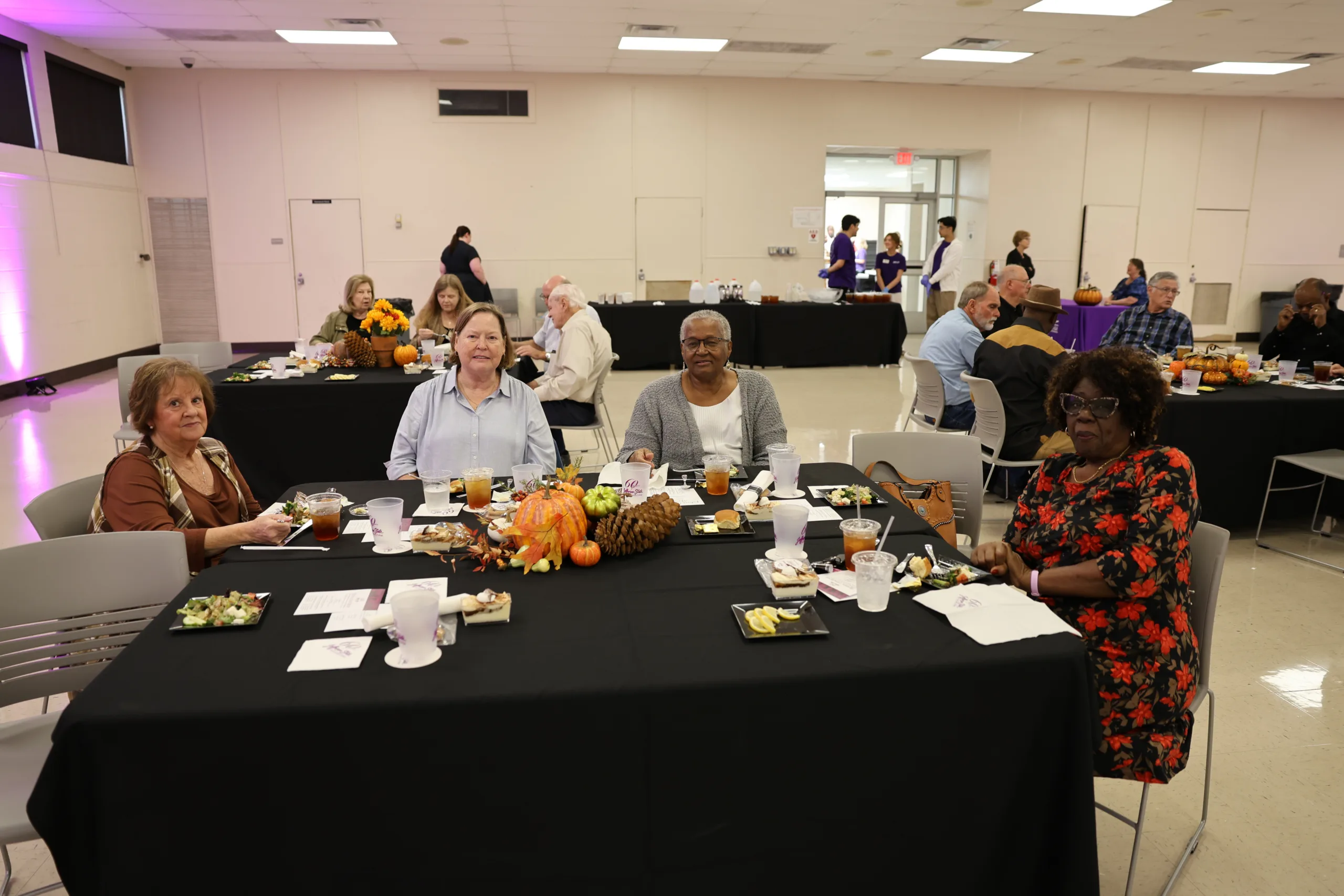 2025 Retiree luncheon attendees eating lunch.