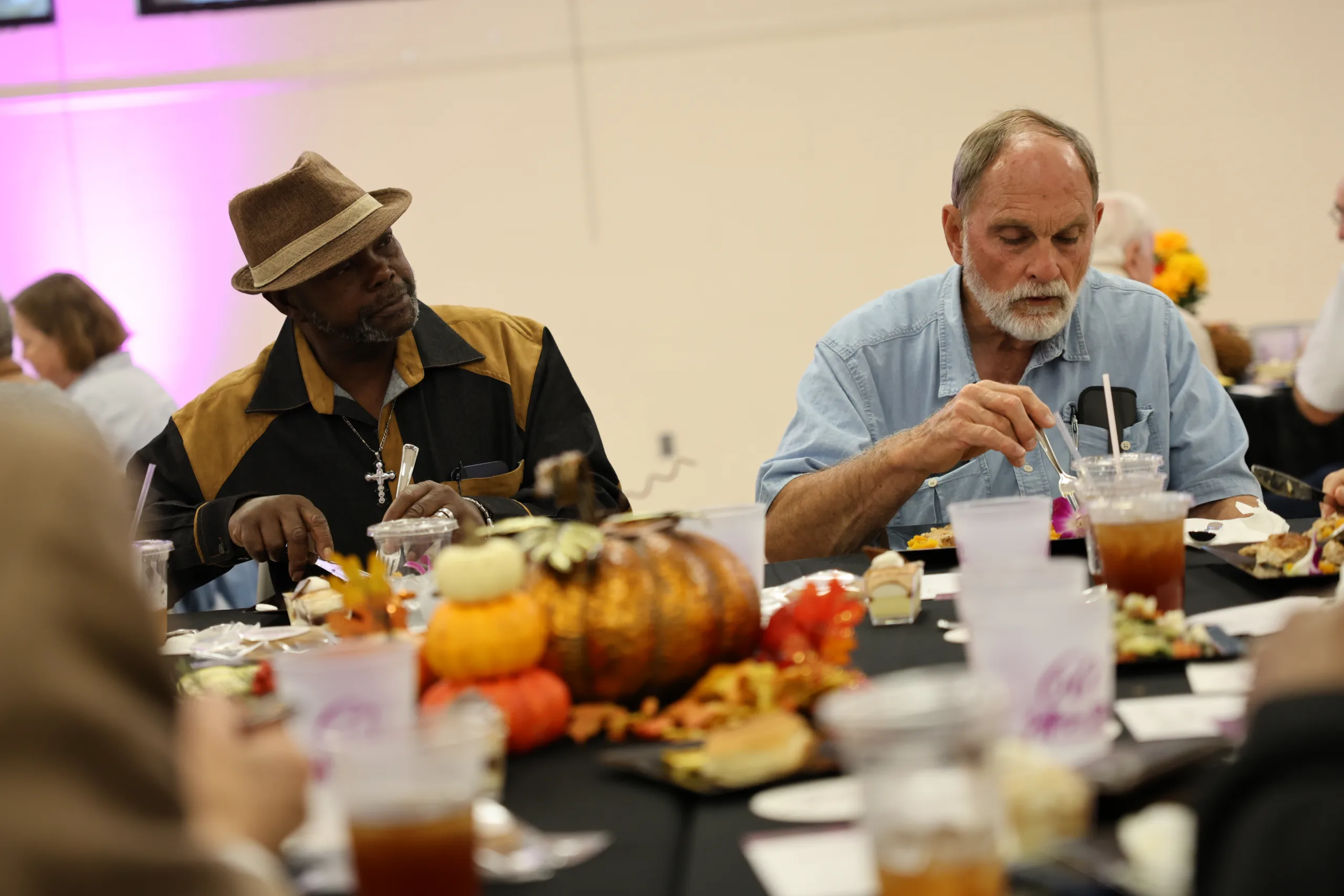 2025 Retiree luncheon attendees eating lunch.