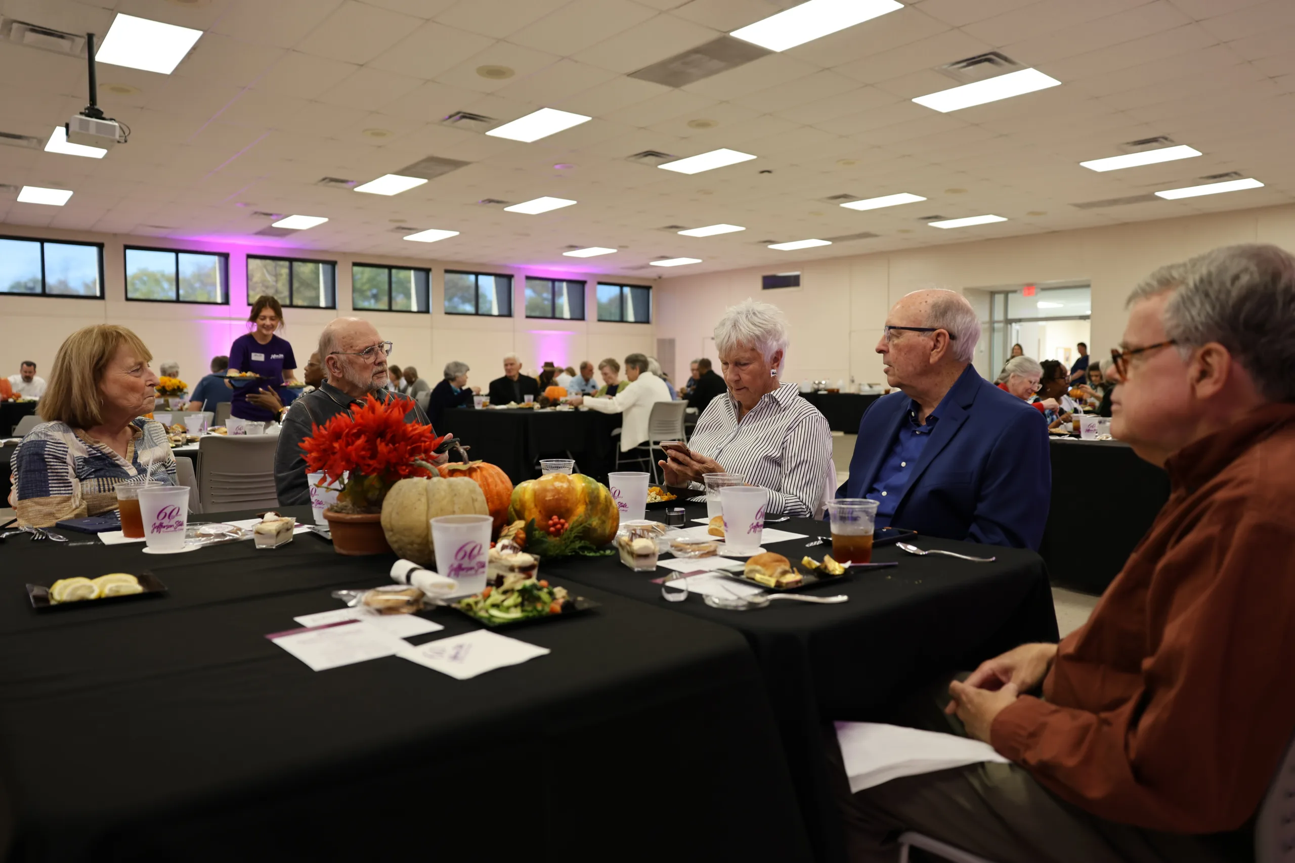 2025 Retiree luncheon attendees enjoying lunch.