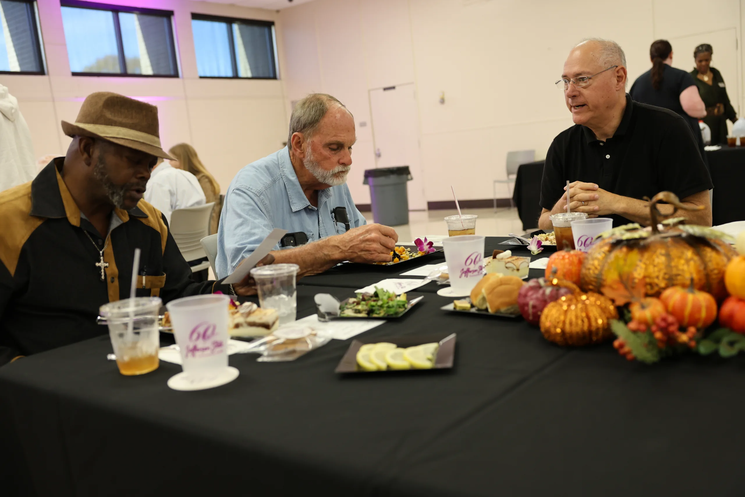 2025 Retiree luncheon attendees enjoying lunch.