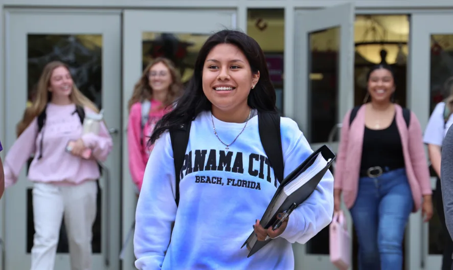 students walking in front of the pell city campus