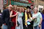 Graduate pose for picture with family