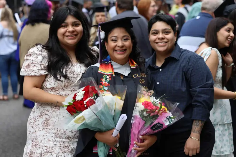 Graduates pose for picture