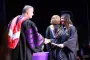 President Brown hands out diploma at ceremony