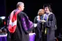 President Brown hands out diploma at ceremony