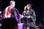 President Brown hands out diploma at ceremony