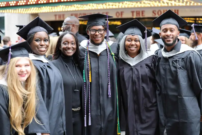 Graduates pose for picture