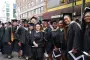 Graduates pose outside for picture