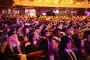 Graduates listen to commencement speaker