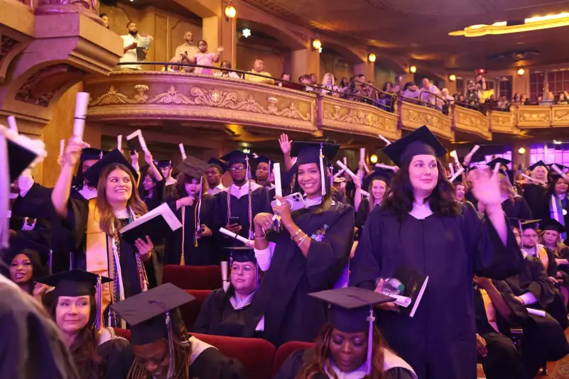 Graduates pose for picture