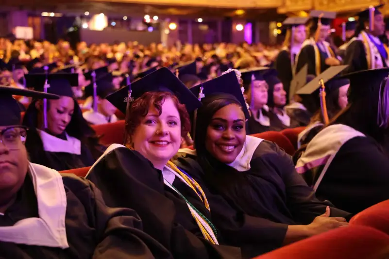 Graduates pose for picture
