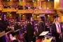 Graduate wait in line for name to be called for diploma